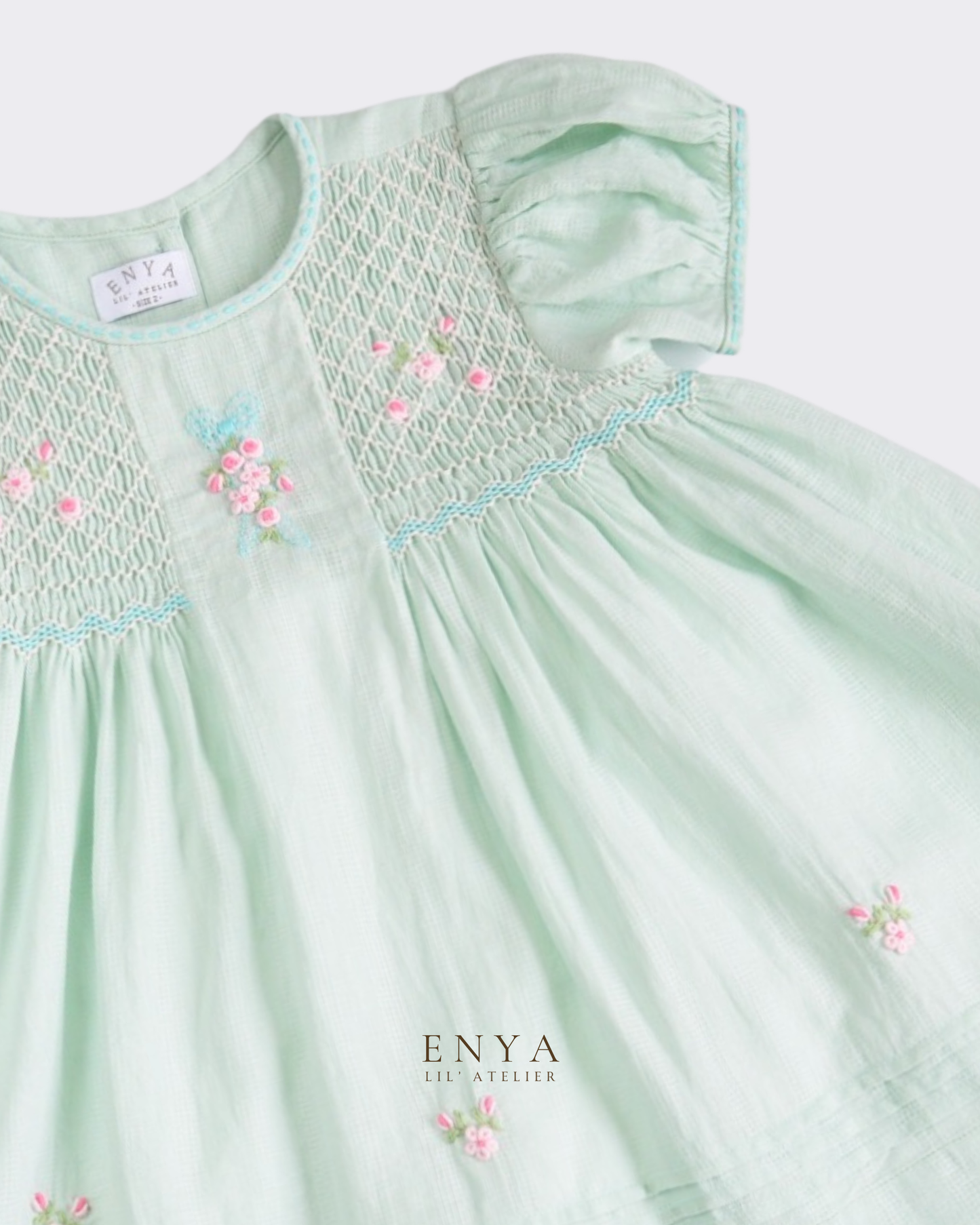 Mila Babydoll Handsmocked Dress