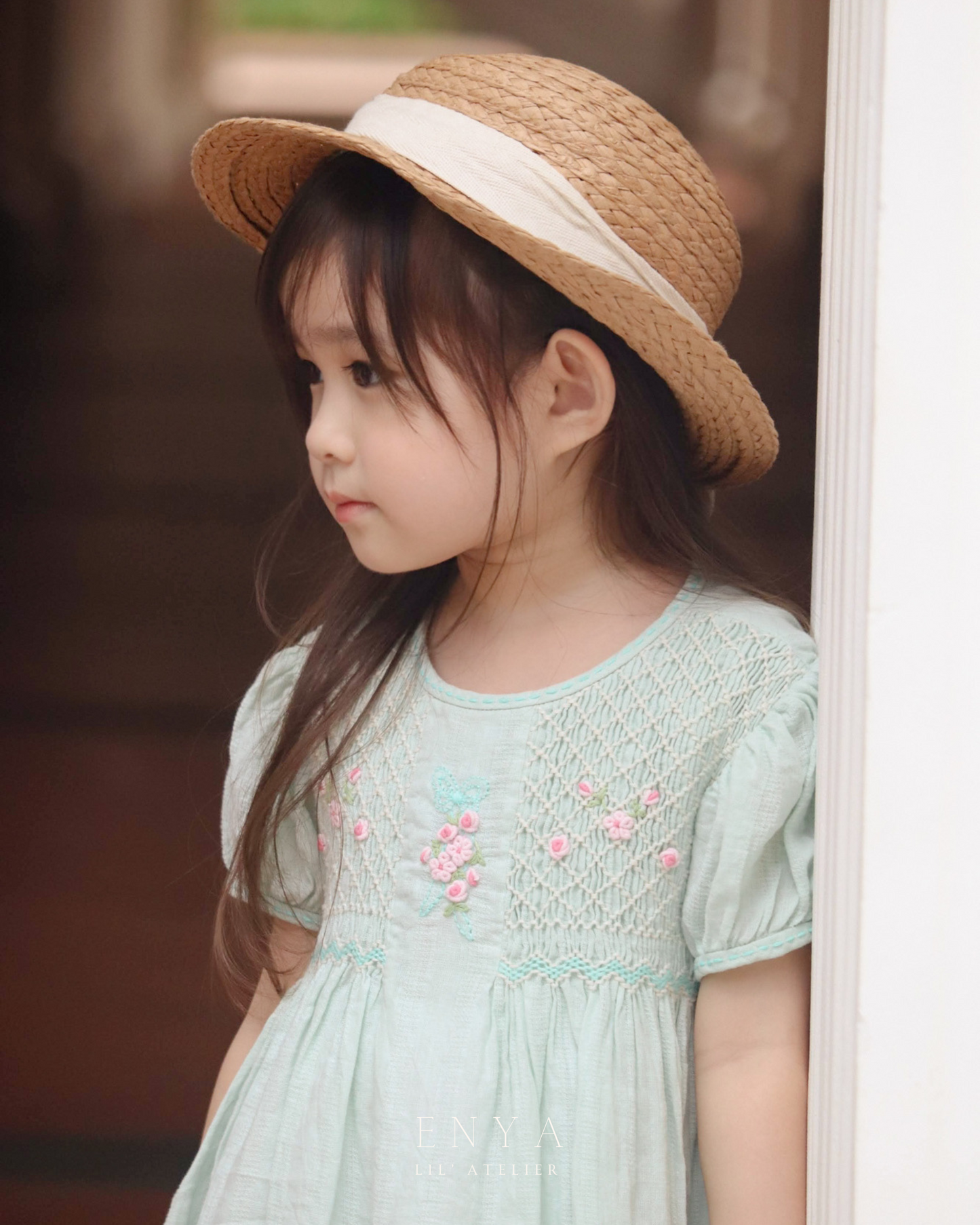 Mila Babydoll Handsmocked Dress