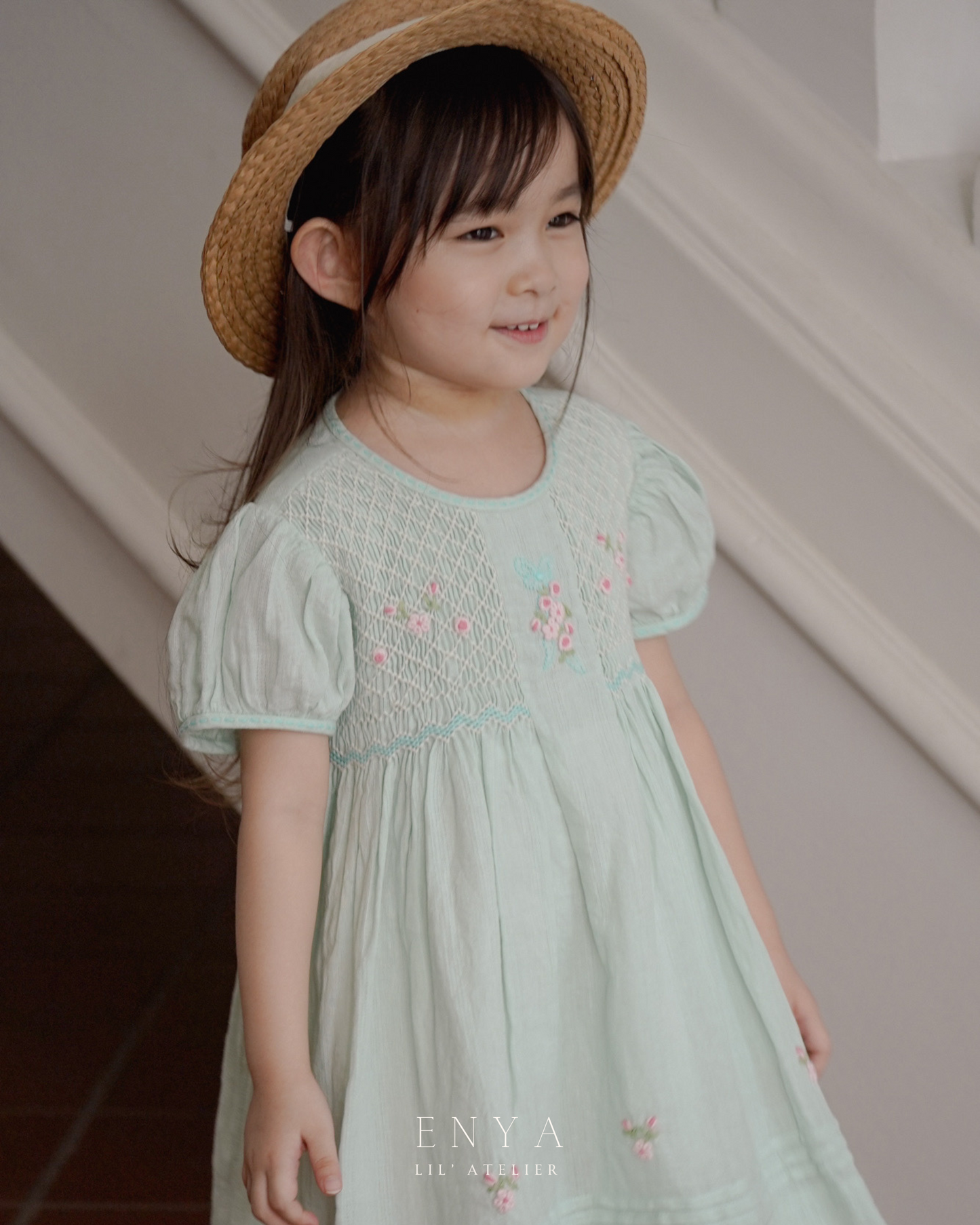 Mila Babydoll Handsmocked Dress