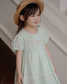 Mila Babydoll Handsmocked Dress